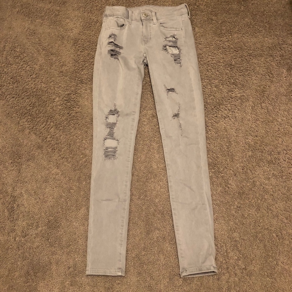 American Eagle grey light wash jeans with rips